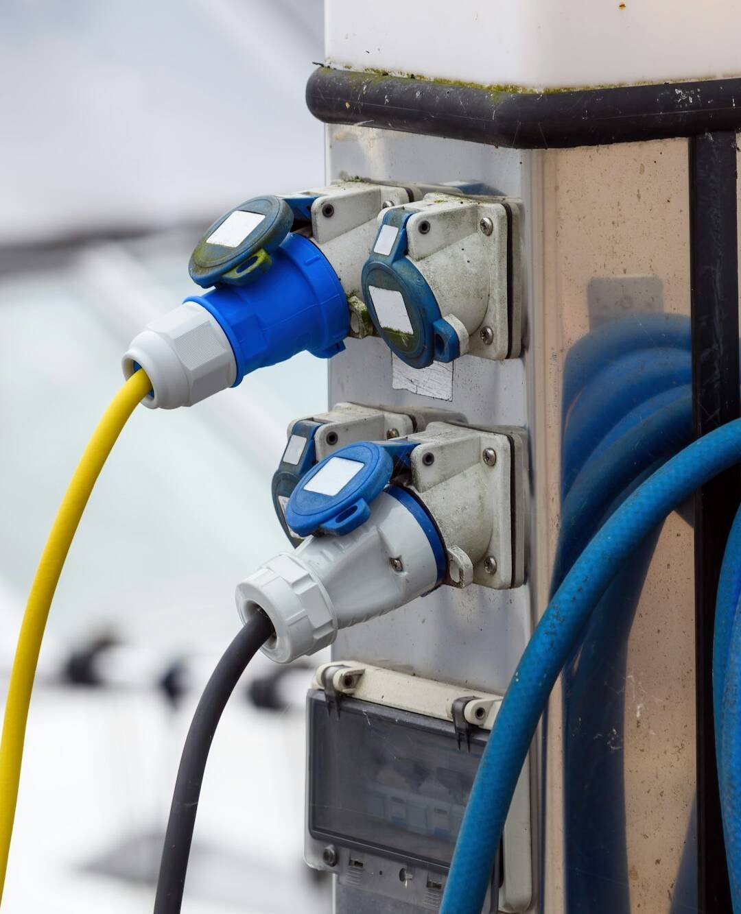 Electric boat charging station at the river quay